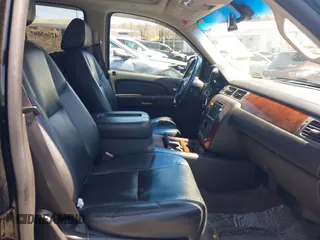 2009 Chevrolet Suburban LTZ with VIN 1GNFK36399J124158, listed as a IAAI auction lot 42063097 with 204,856 mi miles. Bid and sale history available at carsss.com. Image 5.