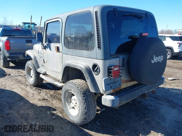 2002 Jeep Wrangler Sport with VIN 1J4FA49SX2P732367, listed as a IAAI auction lot 41805923 with 204,757 mi miles. Bid and sale history available at carsss.com. Image 3.