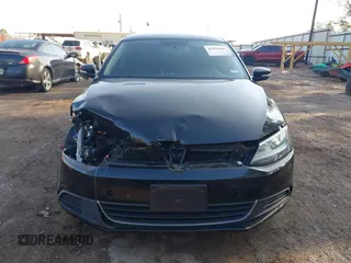 2014 Volkswagen Jetta Sedan SE w/Connectivity with VIN 3VWD07AJ8EM427848, listed as a IAAI auction lot 40988647 with 134,773 mi miles. Bid and sale history available at carsss.com. Image 6.