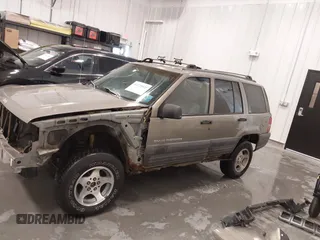 1997 Jeep Grand Cherokee Laredo with VIN 1J4GZ58S2VC746778, listed as a IAAI auction lot 41225925 with 196,679 mi miles. Bid and sale history available at carsss.com. Image 15.