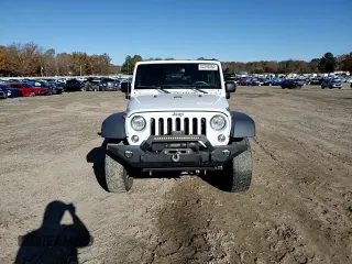 2018 Jeep Wrangler JK Unlimited Sport S with VIN 1C4BJWDG2JL879078, listed as a Copart auction lot 84290864 with 24,457 mi miles and Salvage Title. Bid and sale history available at carsss.com. Image 12.