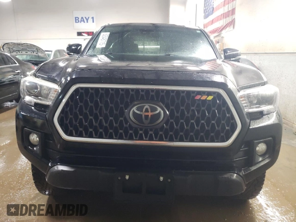 2018 Toyota Tacoma SR with VIN 3TMCZ5AN8JM157719, listed as a Copart auction lot 50548715 with 107,453 mi miles and Salvage Title. Bid and sale history available at carsss.com. Image 5.