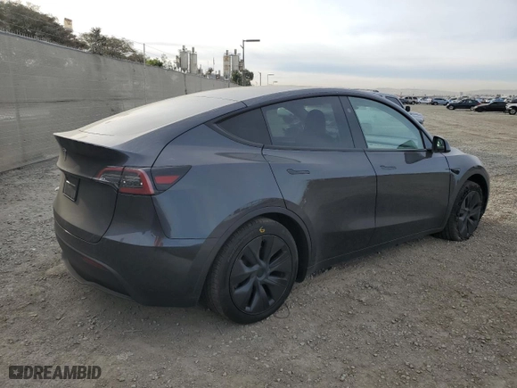 2024 Tesla Model Y with VIN 7SAYGDED7RF114483, listed as a Copart auction lot 89407875 with 7,741 mi miles and Salvage Title. Bid and sale history available at carsss.com. Image 3.