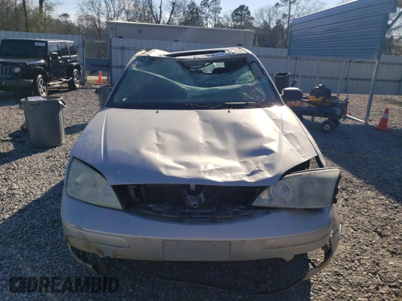 2005 Ford Focus S with VIN 3FAFP31N95R153930, listed as a Copart auction lot 47019315 with 96,985 mi miles and Salvage title. Bid and sale history available at DreamBid. Image 5.