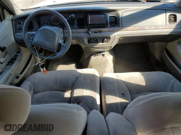 2000 Ford Crown Victoria LX z VIN 2FAFP74W0YX125595, wystawiony jako Copart lot #84675434 z przebiegiem 151 438 mil mil oraz Szkoda całkowita • Salvage title. Historia ofert i sprzedaży dostępna na DreamBid. Obrazek 8.