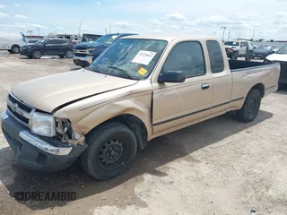 2000 Toyota Tacoma z VIN 5TEVL52N4YZ717158, wystawiony jako IAAI lot #42223643 z przebiegiem 180 515 mil mil oraz . Historia ofert i sprzedaży dostępna na DreamBid. Obrazek 2.