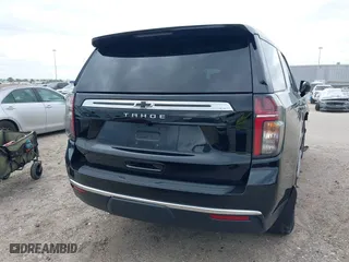 2023 Chevrolet Tahoe LS with VIN 1GNSCMKD9PR157174, listed as a IAAI auction lot 40299056 with 25,588 mi miles. Bid and sale history available at carsss.com. Image 16.