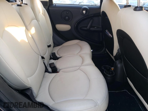 2015 MINI Countryman S with VIN WMWZC5C57FWP48606, listed as a Copart auction lot 47212255 with 104,922 mi miles and Salvage Title. Bid and sale history available at DreamBid. Image 10.