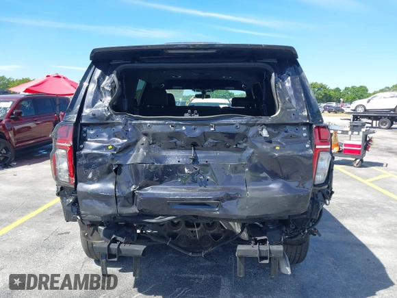 2022 Chevrolet Tahoe Commercial z VIN 1GNSCLED5NR336184, wystawiony jako IAAI lot #41729180 z przebiegiem 14 951 mil mil oraz . Historia ofert i sprzedaży dostępna na DreamBid. Obrazek 16.