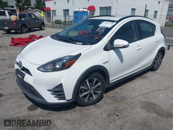 2018 Toyota Prius One with VIN JTDKDTB33J1613019, listed as a IAAI auction lot 42063768 with 59,143 mi miles and . Bid and sale history available at DreamBid. Image 17.