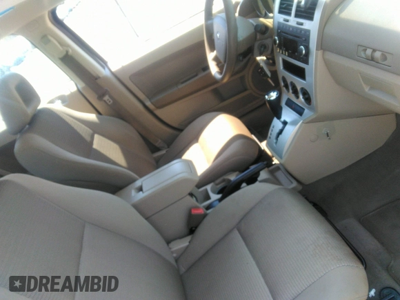 2009 Dodge Caliber SXT with VIN 1B3HB48A19D259105, listed as a IAAI auction lot 41881974 with 127,096 mi miles and . Bid and sale history available at DreamBid. Image 5.