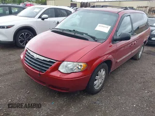 2005 Chrysler Town & Country Touring z VIN 2C4GP54L15R400903, wystawiony jako IAAI lot #42292131 z przebiegiem 149 371 mil mil oraz . Historia ofert i sprzedaży dostępna na DreamBid. Obrazek 2.