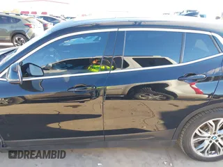 2019 BMW X2 sDrive28i with VIN WBXYJ3C50KEP77327, listed as a IAAI auction lot 40922194 with 94,672 mi miles. Bid and sale history available at carsss.com. Image 15.