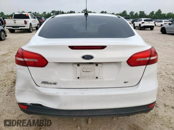 2018 Ford Focus SE with VIN 1FADP3F23JL246375, listed as a Copart auction lot 56539005 with 83,130 mi miles and Salvage title. Bid and sale history available at DreamBid. Image 6.