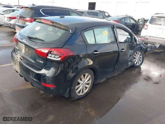 2015 Kia Forte 5-Door SX with VIN KNAFZ5A36F5359867, listed as a IAAI auction lot 41713090 with 72,048 mi miles. Bid and sale history available at carsss.com. Image 4.