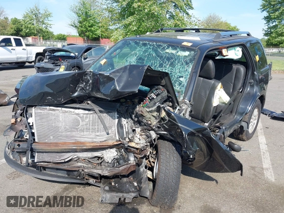 2011 Mercury Mariner Premier with VIN 4M2CN9HG7BKJ01459, listed as a IAAI auction lot 42231597 with 168,362 mi miles and . Bid and sale history available at DreamBid. Image 17.