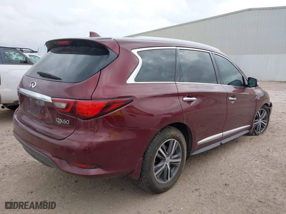 2019 Infiniti QX60 PURE with VIN 5N1DL0MM7KC558351, listed as a IAAI auction lot 41685778 with 100,949 mi miles. Bid and sale history available at carsss.com. Image 4.