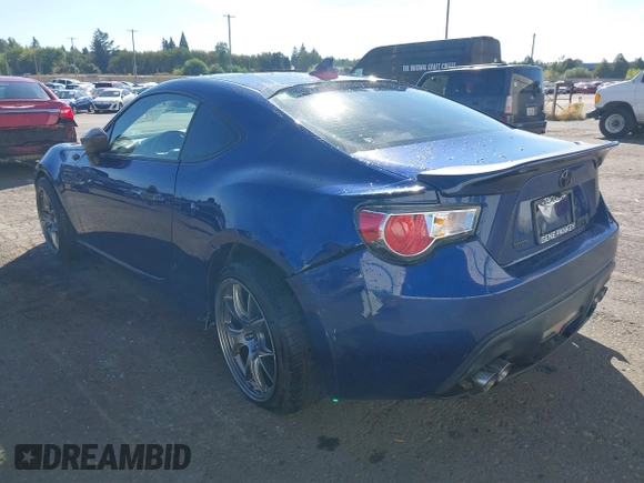 2013 Scion FR-S with VIN JF1ZNAA11D2702415, listed as a IAAI auction lot 40381041 with 63,581 mi miles. Bid and sale history available at carsss.com. Image 3.