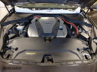 2014 Infiniti Q50 Hybrid Premium with VIN JN1AV7AR3EM702182, listed as a IAAI auction lot 41577667 with 61,599 mi miles. Bid and sale history available at carsss.com. Image 10.