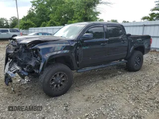 2016 Toyota Tacoma SR with VIN 3TMCZ5AN2GM023572, listed as a Copart auction lot 61368115 with 113,802 mi miles and Salvage title. Bid and sale history available at DreamBid. Image 1.