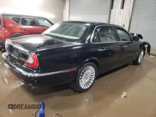 2005 Jaguar XJ Vanden Plas z VIN SAJWA82C65SG44373, wystawiony jako Copart lot #84091444 z przebiegiem 141 993 mil mil oraz Szkoda całkowita • Salvage title. Historia ofert i sprzedaży dostępna na DreamBid. Obrazek 3.
