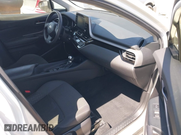 2020 Toyota C-HR LE with VIN JTNKHMBX3L1074882, listed as a IAAI auction lot 42064899 with 44,897 mi miles and . Bid and sale history available at DreamBid. Image 5.