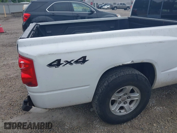 2005 Dodge Dakota SLT with VIN 1D7HW42N75S213191, listed as a IAAI auction lot 42345554 with 152,833 mi miles and . Bid and sale history available at DreamBid. Image 13.
