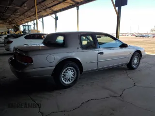 1995 Mercury Cougar z VIN 1MELM62W2SH613956, wystawiony jako Copart lot #49742425 z przebiegiem 94 806 mil mil oraz Tytuł czysty. Historia ofert i sprzedaży dostępna na DreamBid. Obrazek 3.