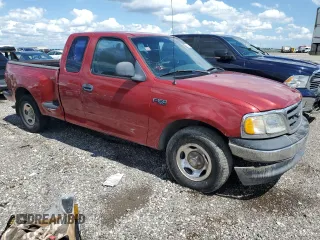 2001 Ford F-150 XL with VIN 1FTZX07261KA62955, listed as a Copart auction lot 56580915 with 159,451 mi miles and Salvage title. Bid and sale history available at DreamBid. Image 4.