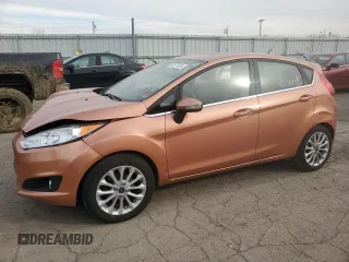 2017 Ford Fiesta Titanium with VIN 3FADP4FJ8HM164132, listed as a Copart auction lot 82577424 with 63,686 mi miles and Salvage Title. Bid and sale history available at DreamBid. Image 1.