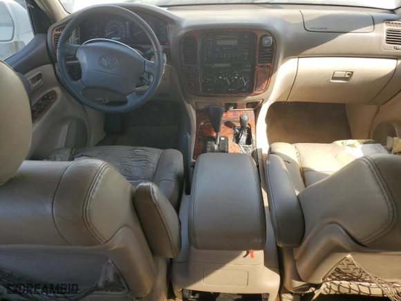 1999 Toyota Land Cruiser with VIN JT3HT05J0X0059222, listed as a Copart auction lot 77713294 with 406,869 mi miles and Clean Title. Bid and sale history available at carsss.com. Image 8.