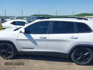 2019 Jeep Cherokee Latitude Plus with VIN 1C4PJLLB0KD339282, listed as a IAAI auction lot 42231050 with 115,901 mi miles and . Bid and sale history available at DreamBid. Image 14.