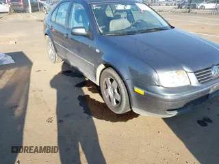 2004 Volkswagen Jetta GL z VIN 3VWRA69M64M044291, wystawiony jako IAAI lot #41882666 z przebiegiem 205 029 mil mil oraz . Historia ofert i sprzedaży dostępna na DreamBid. Obrazek 6.