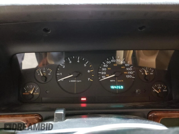 1997 Jeep Grand Cherokee Laredo with VIN 1J4GZ58S6VC573007, listed as a Copart auction lot 42728355 with 164,269 mi miles and Salvage Title. Bid and sale history available at carsss.com. Image 9.