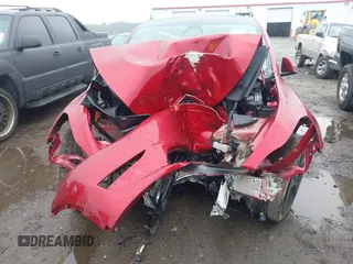 2024 Tesla Model Y z VIN 7SAYGDED9RA304010, wystawiony jako IAAI lot #42366995 z przebiegiem Nie podano mil oraz . Historia ofert i sprzedaży dostępna na DreamBid. Obrazek 11.
