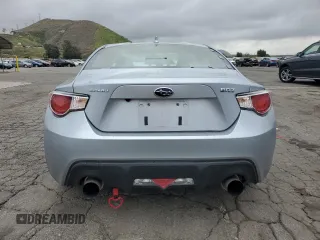 2015 Subaru BRZ Premium with VIN JF1ZCAB12F9607084, listed as a Copart auction lot 53743495 with 57,486 mi miles and Salvage title. Bid and sale history available at DreamBid. Image 6.