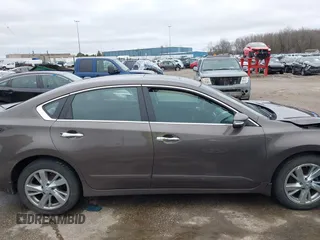 2014 Nissan Altima SL with VIN 1N4AL3APXEN214860, listed as a IAAI auction lot 42080411 with 115,962 mi miles and . Bid and sale history available at DreamBid. Image 13.