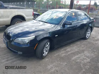 2008 BMW 5 Series 528i with VIN WBANU53558C117336, listed as a IAAI auction lot 42088002 with 127,411 mi miles and . Bid and sale history available at carsss.com. Image 2.