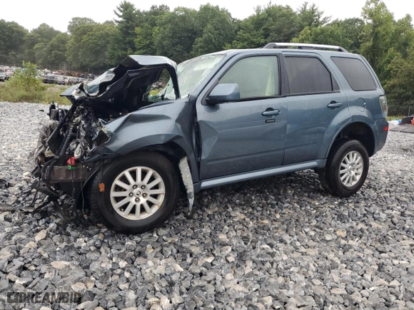 2010 Mercury Mariner Premier with VIN 4M2CN9HG9AKJ11618, listed as a Copart auction lot 64949334 with 0 mi miles and Salvage Title. Bid and sale history available at carsss.com. Image 1.