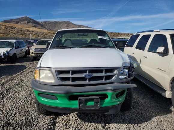 1998 Ford F-150 Standard with VIN 1FTZF1821WKB21778, listed as a Copart auction lot 73009444 with 220,898 mi miles and Salvage Title. Bid and sale history available at carsss.com. Image 5.