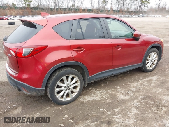 2013 Mazda CX-5 Grand Touring with VIN JM3KE4DE8D0164374, listed as a IAAI auction lot 41820866 with 145,815 mi miles. Bid and sale history available at carsss.com. Image 4.