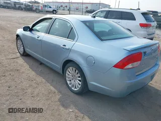 2010 Mercury Milan Hybrid z VIN 3MEDM0L33AR660979, wystawiony jako IAAI lot #41994618 z przebiegiem 114 007 mil mil oraz . Historia ofert i sprzedaży dostępna na DreamBid. Obrazek 3.