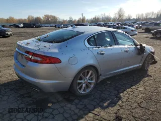 2015 Jaguar XF V6 Portfolio with VIN SAJWA0F7XF8U51105, listed as a Copart auction lot 82865814 with 62,807 mi miles and Salvage Title. Bid and sale history available at carsss.com. Image 3.