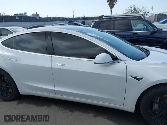 2020 Tesla Model 3 Long Range with VIN 5YJ3E1EB9LF795246, listed as a IAAI auction lot 41895750 with 163,061 mi miles and . Bid and sale history available at DreamBid. Image 14.