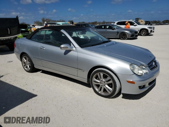 2007 Mercedes-Benz CLK-Class 3.5L with VIN WDBTK56FX7F206030, listed as a Copart auction lot 77271194 with 155,157 mi miles and Salvage Title. Bid and sale history available at carsss.com. Image 4.