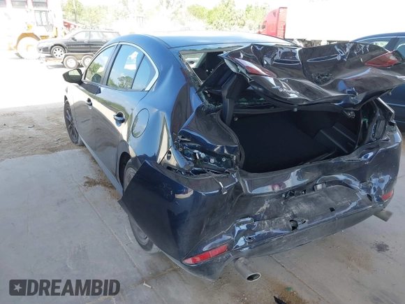 2024 Mazda 3 S with VIN 3MZBPAAM4RM423330, listed as a IAAI auction lot 41582454 with 12,604 mi miles and . Bid and sale history available at DreamBid. Image 3.