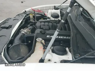 2013 Dodge Charger SRT-8 z VIN 2C3CDXEJXDH675646, wystawiony jako IAAI lot #41464139 z przebiegiem 105 583 mil mil oraz . Historia ofert i sprzedaży dostępna na DreamBid. Obrazek 19.