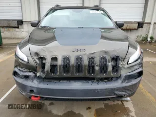 2015 Jeep Cherokee Trailhawk z VIN 1C4PJMBSXFW588030, wystawiony jako Copart lot #55057635 z przebiegiem 116 209 mil mil oraz Szkoda całkowita • Salvage title. Historia ofert i sprzedaży dostępna na DreamBid. Obrazek 5.