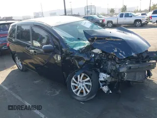 2012 Mazda 5 Sport with VIN JM1CW2BL3C0139204, listed as a IAAI auction lot 41561384 with Not Provided miles. Bid and sale history available at carsss.com. Image 1.