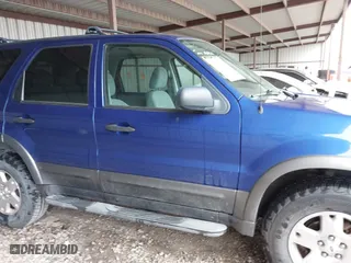 2006 Ford Escape XLT with VIN 1FMYU03166KC05651, listed as a IAAI auction lot 41799174 with 114,594 mi miles. Bid and sale history available at carsss.com. Image 13.